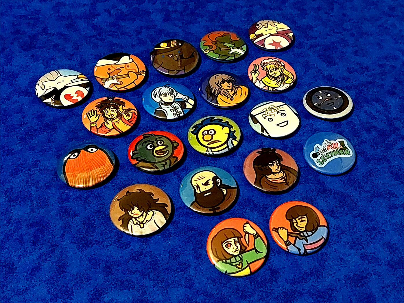 Misc. Fandom Buttons (JJBA Catsaders, +Anima, Don&#39;t Hug Me I&#39;m Scared, LISA the RPG, Tumblr Sexyman Logo, Undertale)
